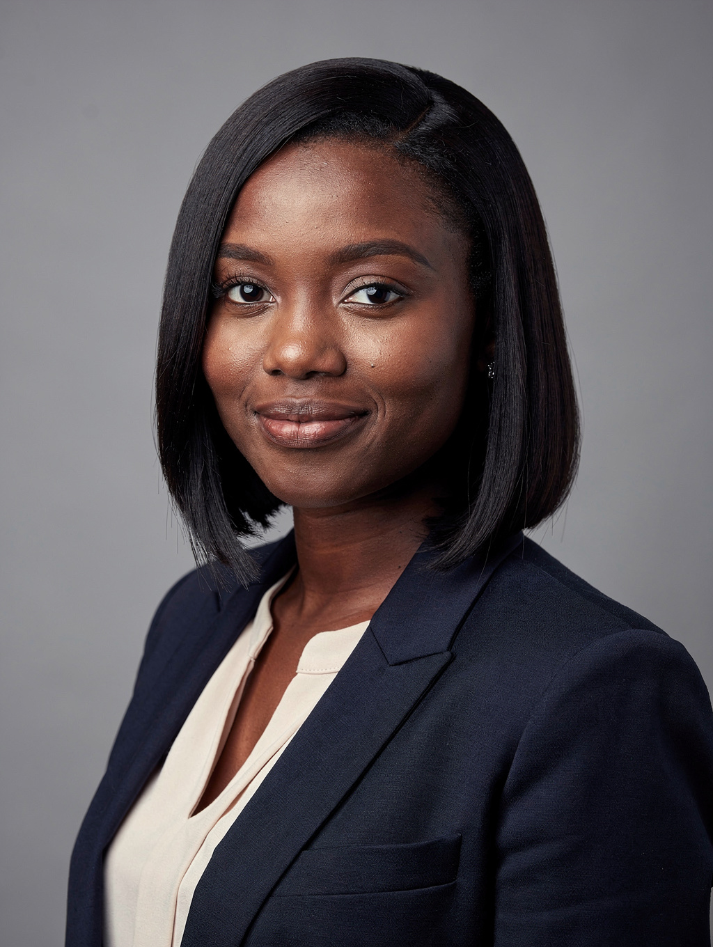 Dr. Amina Diallo, founder of FEMINA, leading a strategy session